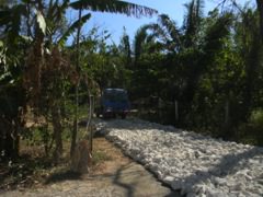 Rocks at both entrances catch any mud or pollutants on the truck's tires before entering public roads.